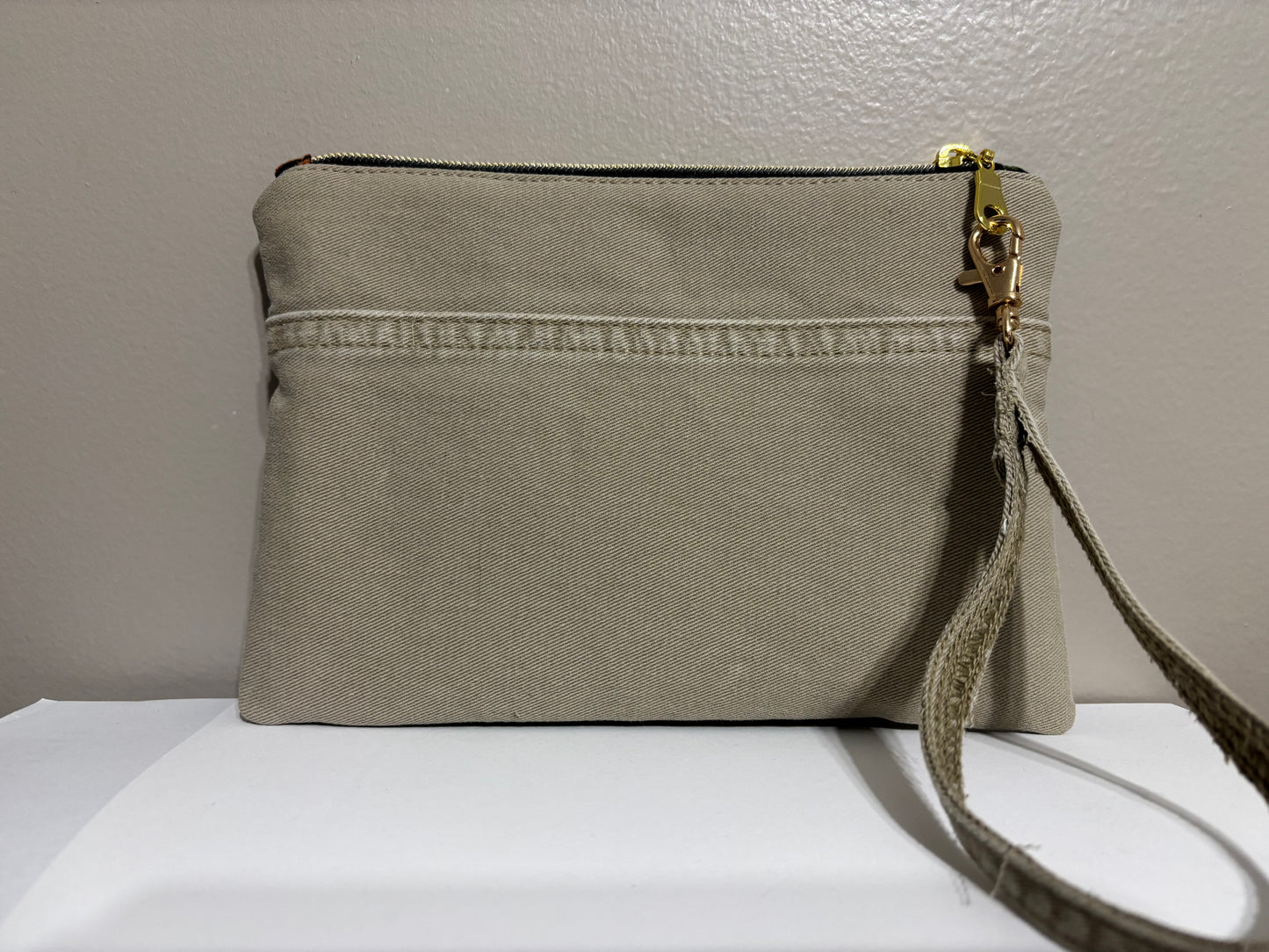Wristlet from Upcycled Khaki Denim Jean Parts and Colorful Orange and Gold Fabric