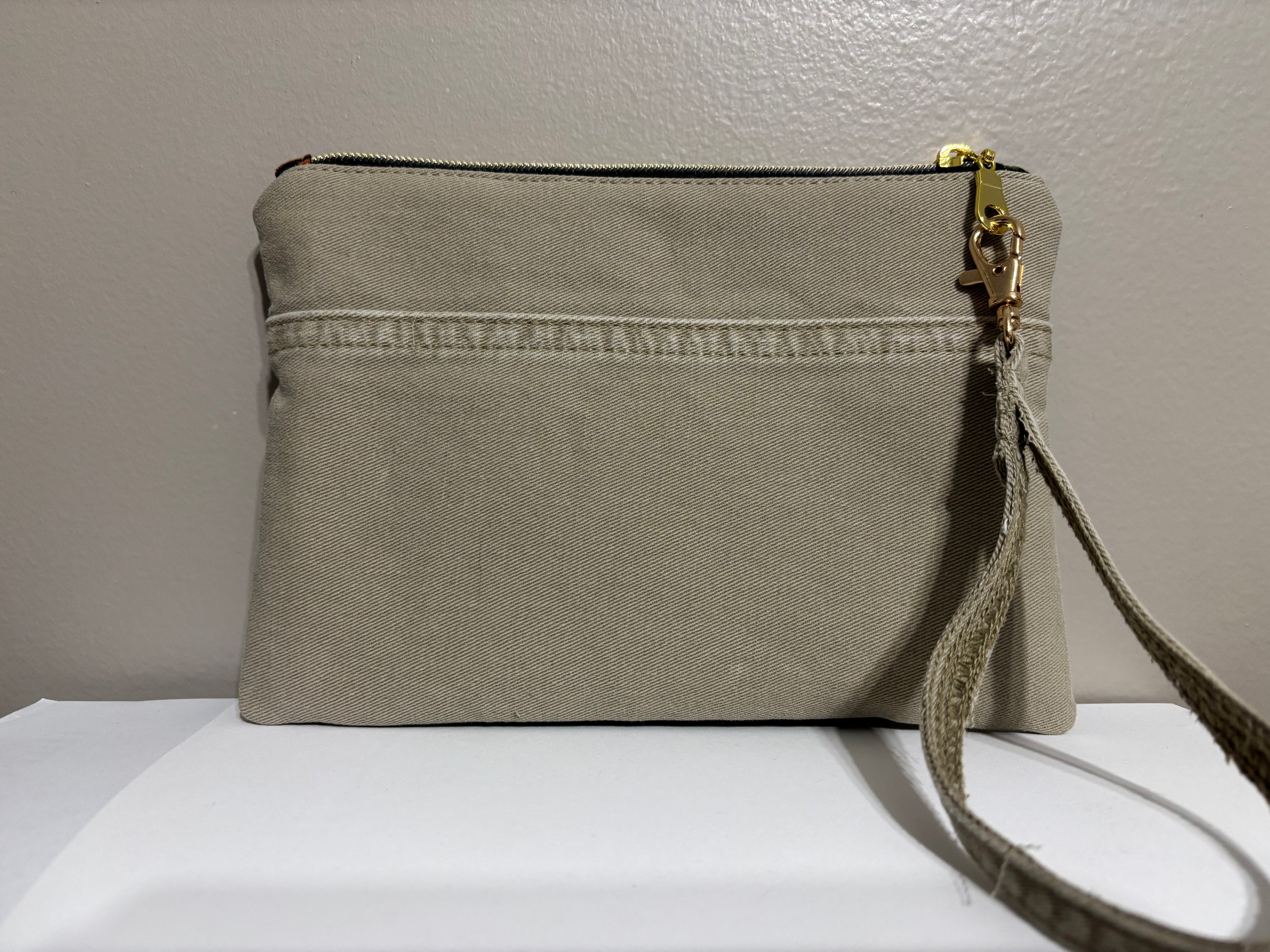 Wristlet from Upcycled Khaki Denim Jean Parts and Colorful Orange and Gold Fabric