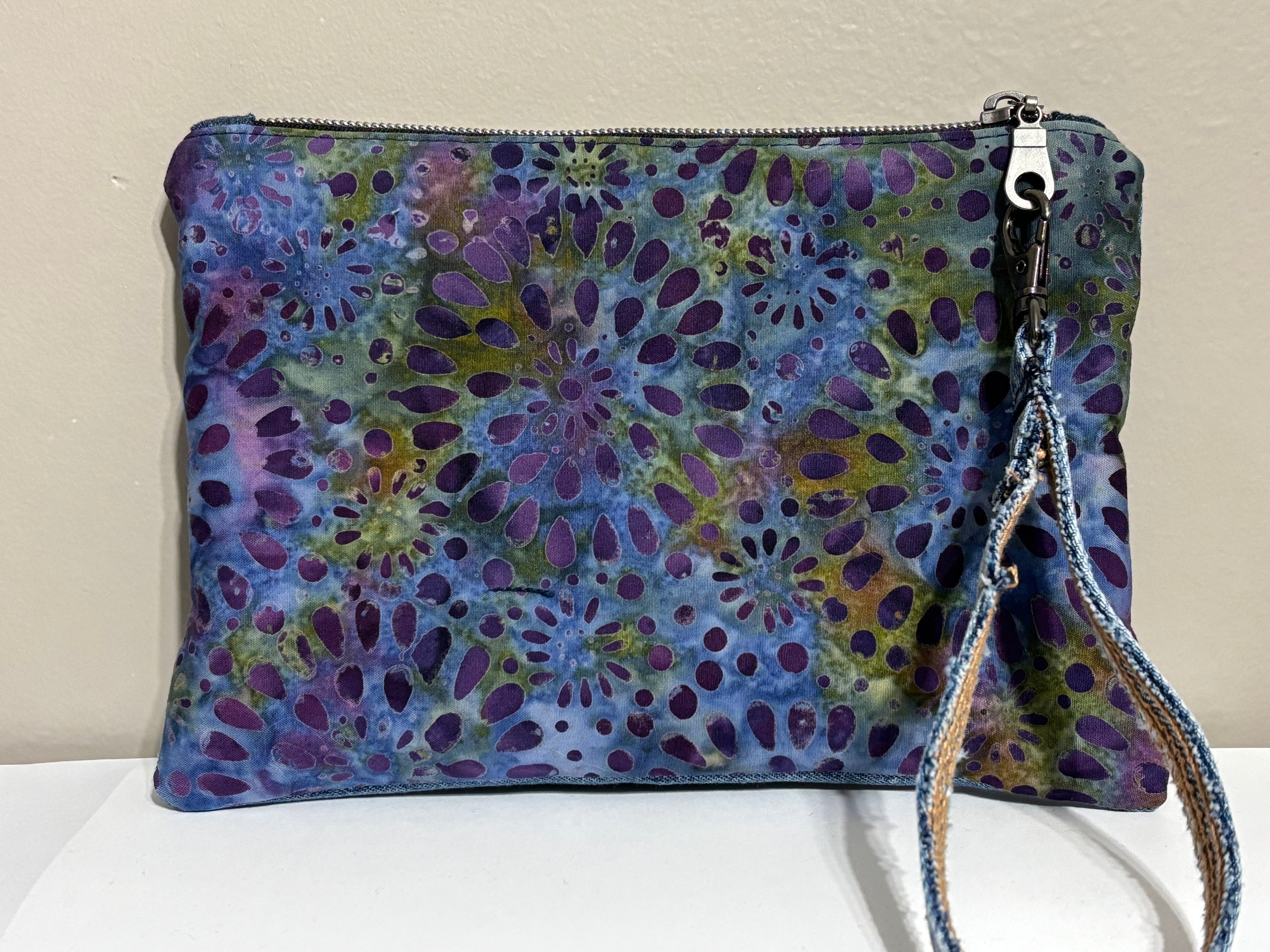 Wristlet from Upcycled Blue Denim Jean Parts and Purple Batik Fabric