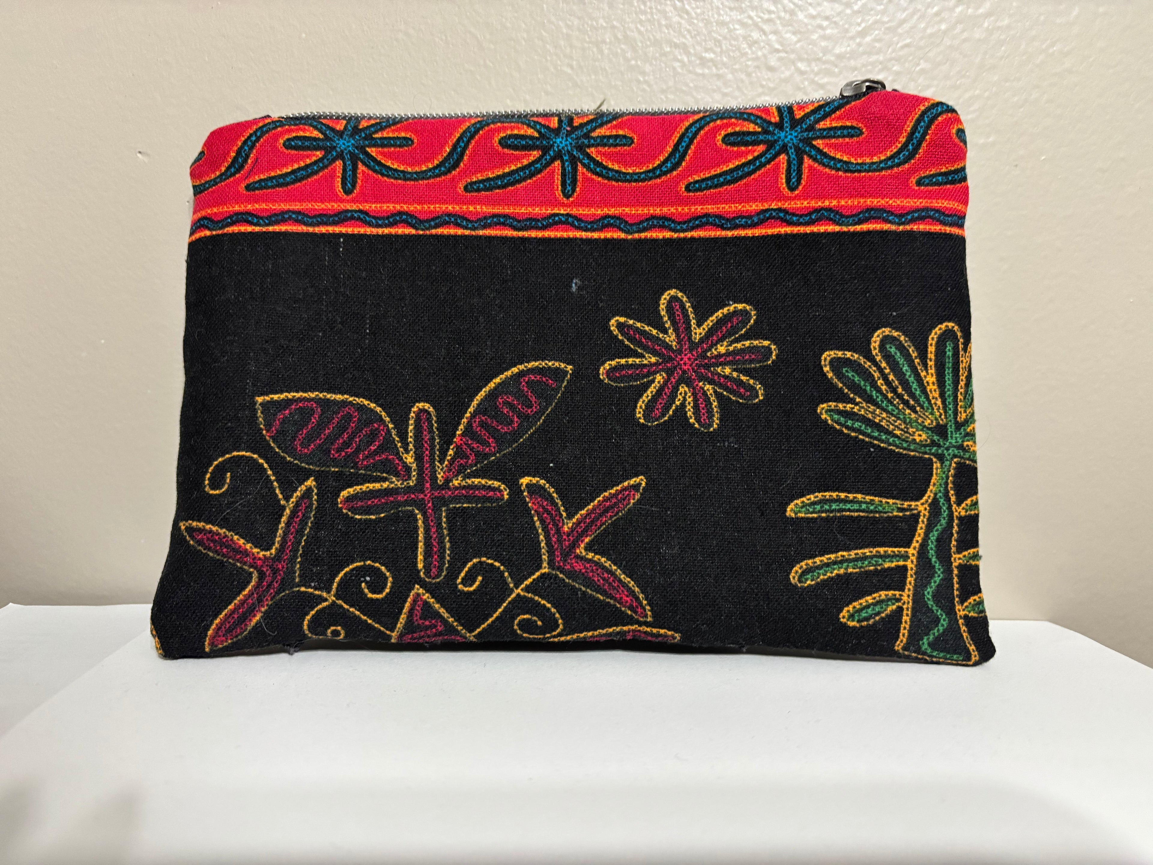 Wristlet from Upcycled Black Denim Parts and Colorful Tribal Fabric